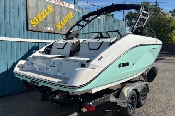 2026 Yamaha Boats 222S on trailer, displayed outdoors at Sizzle Marine dealership.