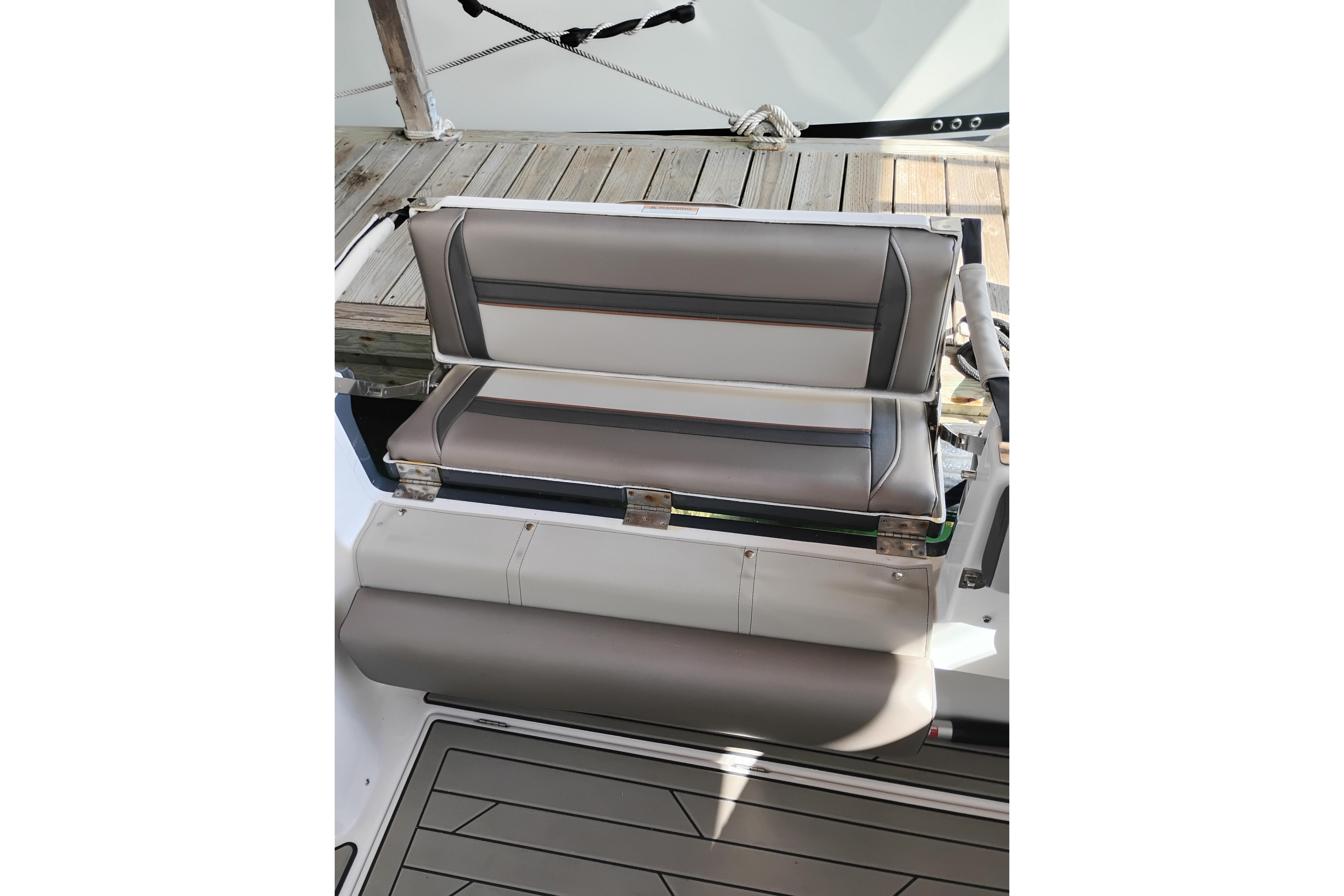 2022 Cutwater C-32 Coupe boat seat with gray and white upholstery.