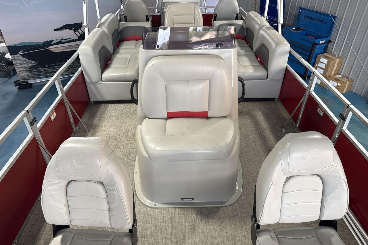 2022 Landau ALURE 232 pontoon boat interior with white and red seating.