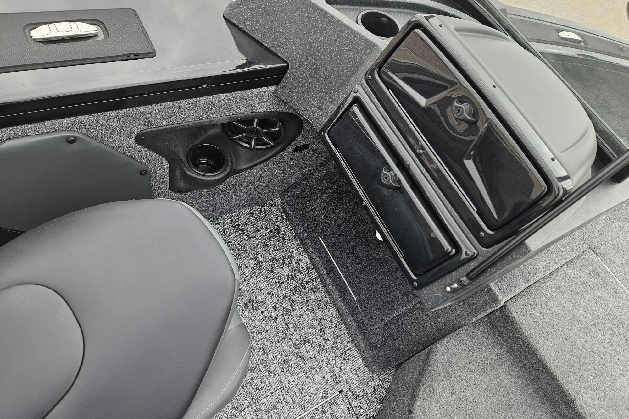 Interior of 2026 Tracker Targa V-19 WT boat with seating and storage compartments.