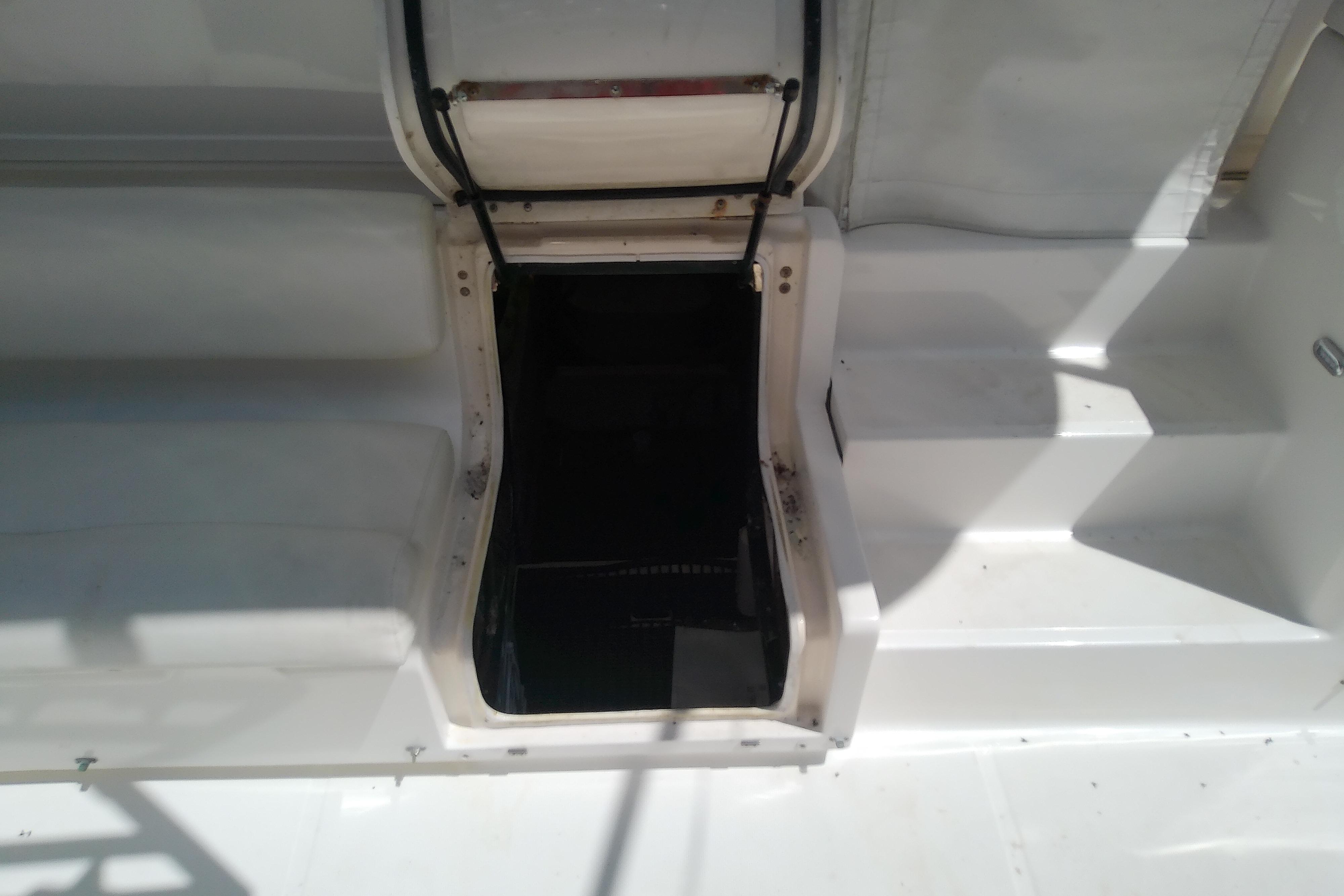 Open hatch on 2000 Tiara Yachts 4100 Open, revealing interior access.