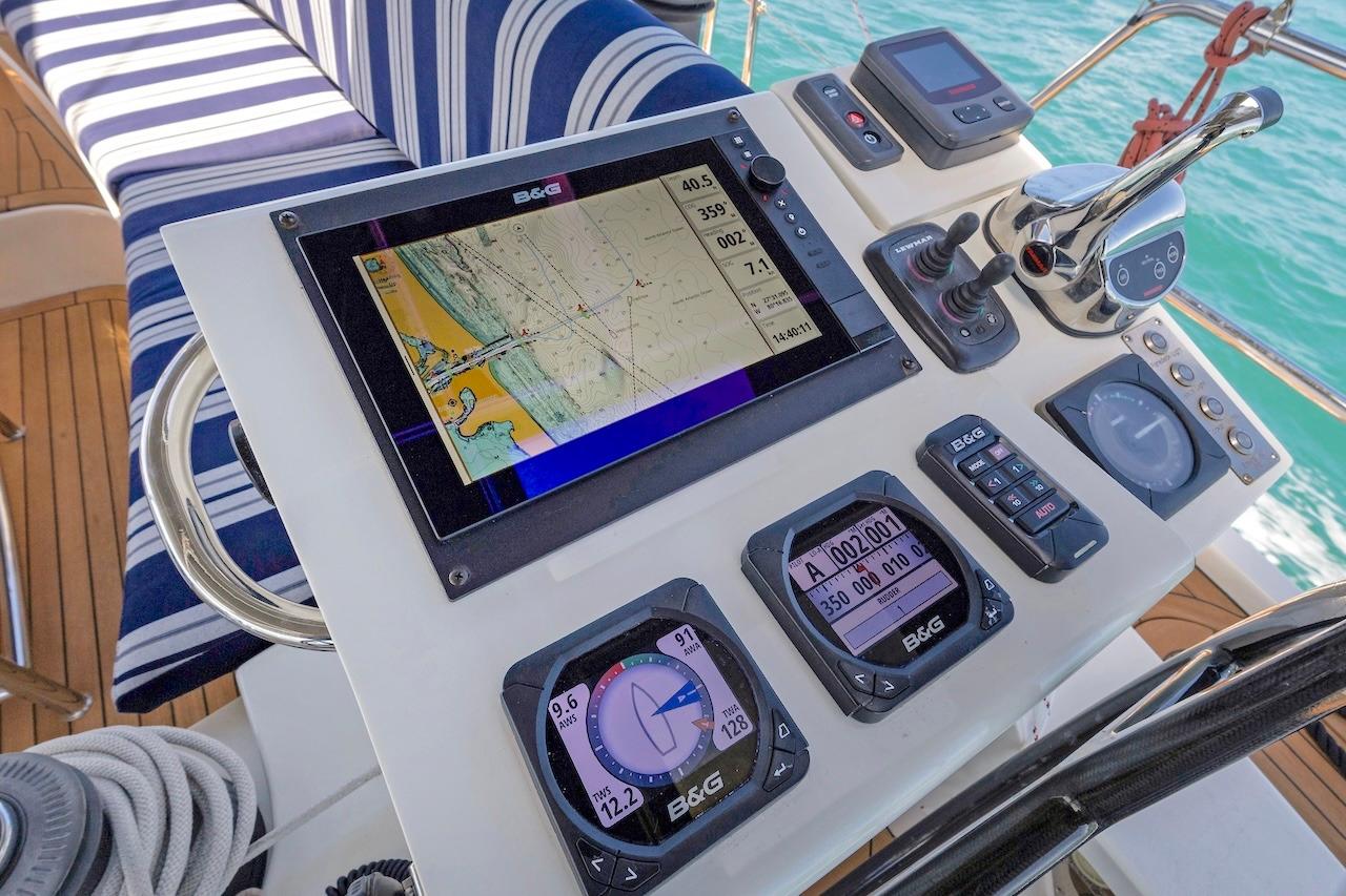 Cockpit of 2011 Southerly 57 RS yacht with navigation instruments and steering wheel.
