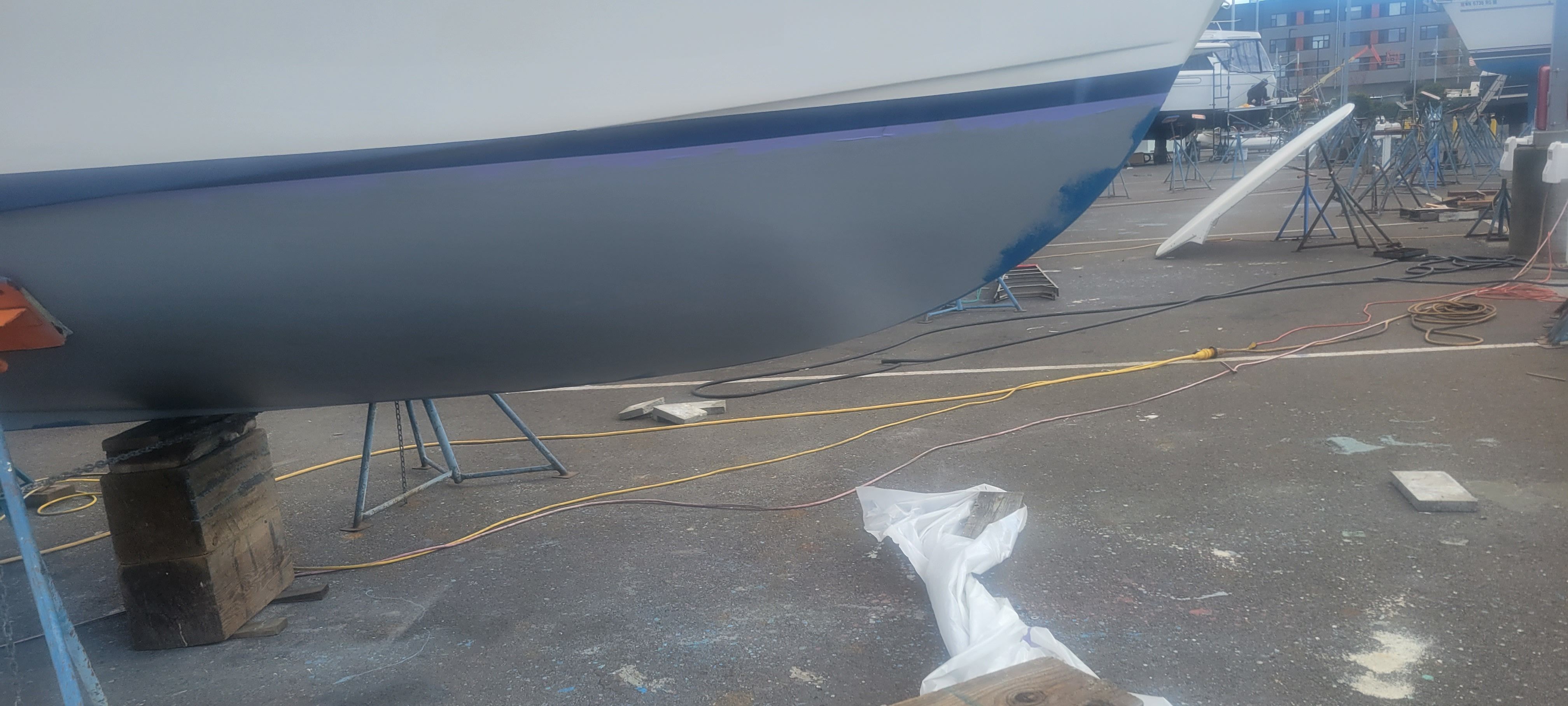 1984 Bayliner 3870 Motoryacht in dry dock, side view of hull.