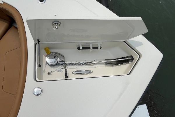 2020 Scout 420 LXF anchor compartment with open hatch, showcasing anchor and chain storage.