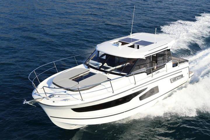 Manufacturer Provided Image: 2020 Jeanneau NC 1095 motor yacht cruising on open water.
