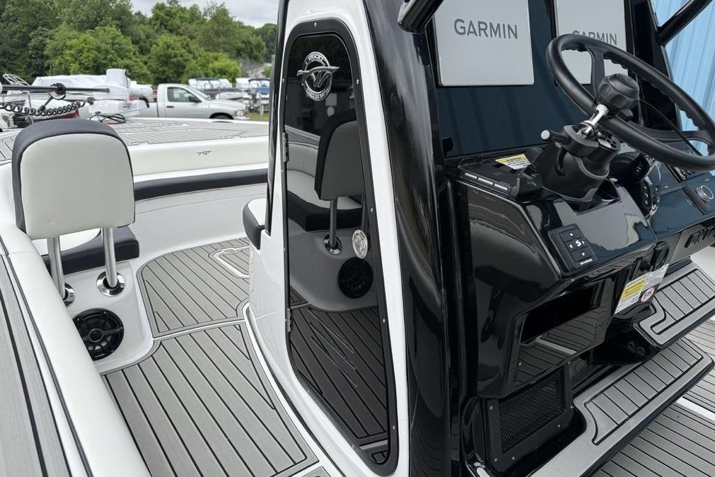 2026 Tidewater 2500 Carolina Bay boat interior with Garmin electronics and sleek design.