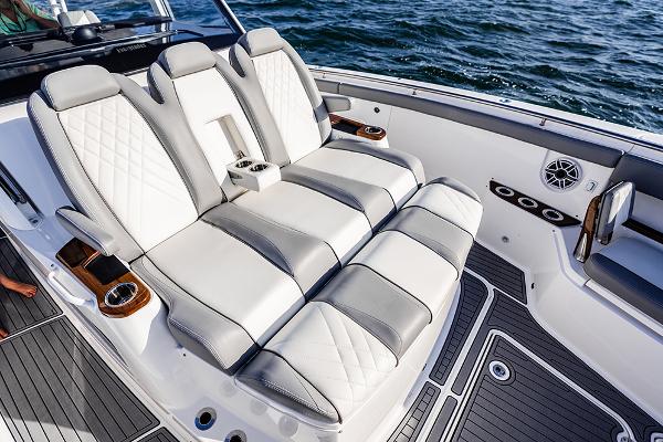 Manufacturer Provided Image: Luxurious seating on 2025 Everglades 455 Center Console boat, featuring elegant design and ocean backdrop.