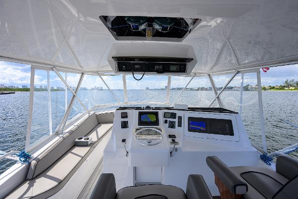 Interior view of 2000 Viking 50 Convertible yacht helm with navigation equipment.