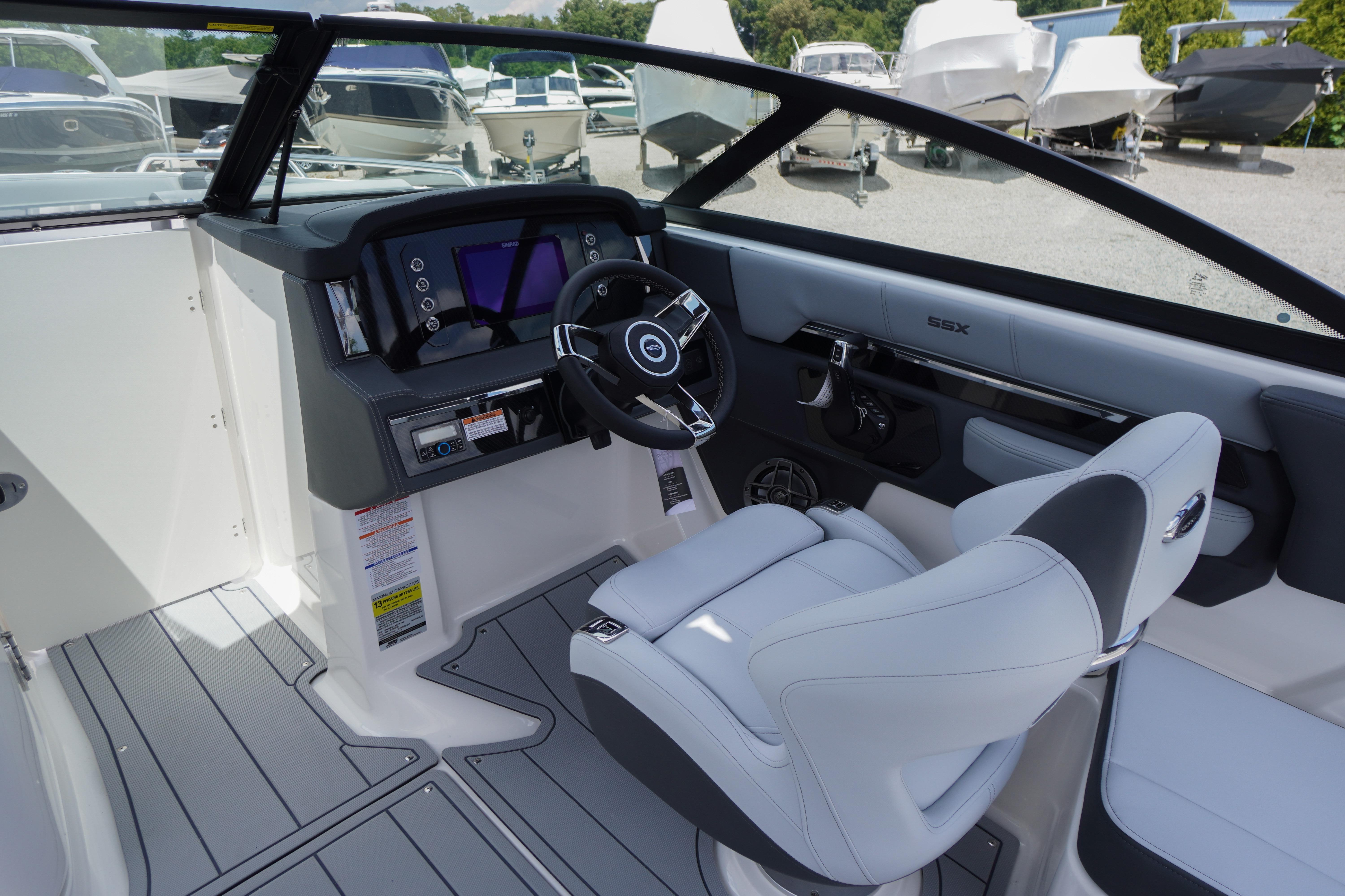 2026 Chaparral SSX 4 boat interior with modern dashboard and steering wheel.