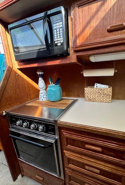 Carver 3807 Yacht kitchen with microwave and stove, 1988 model.