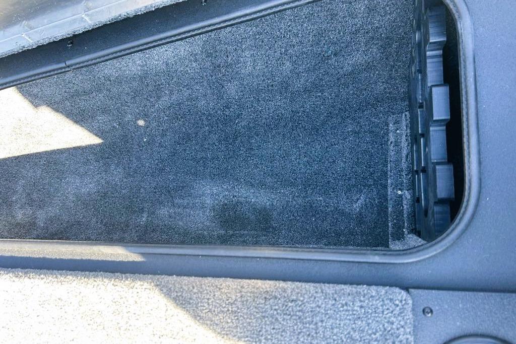 Open storage compartment in 2026 Tracker Pro Team 175 boat.