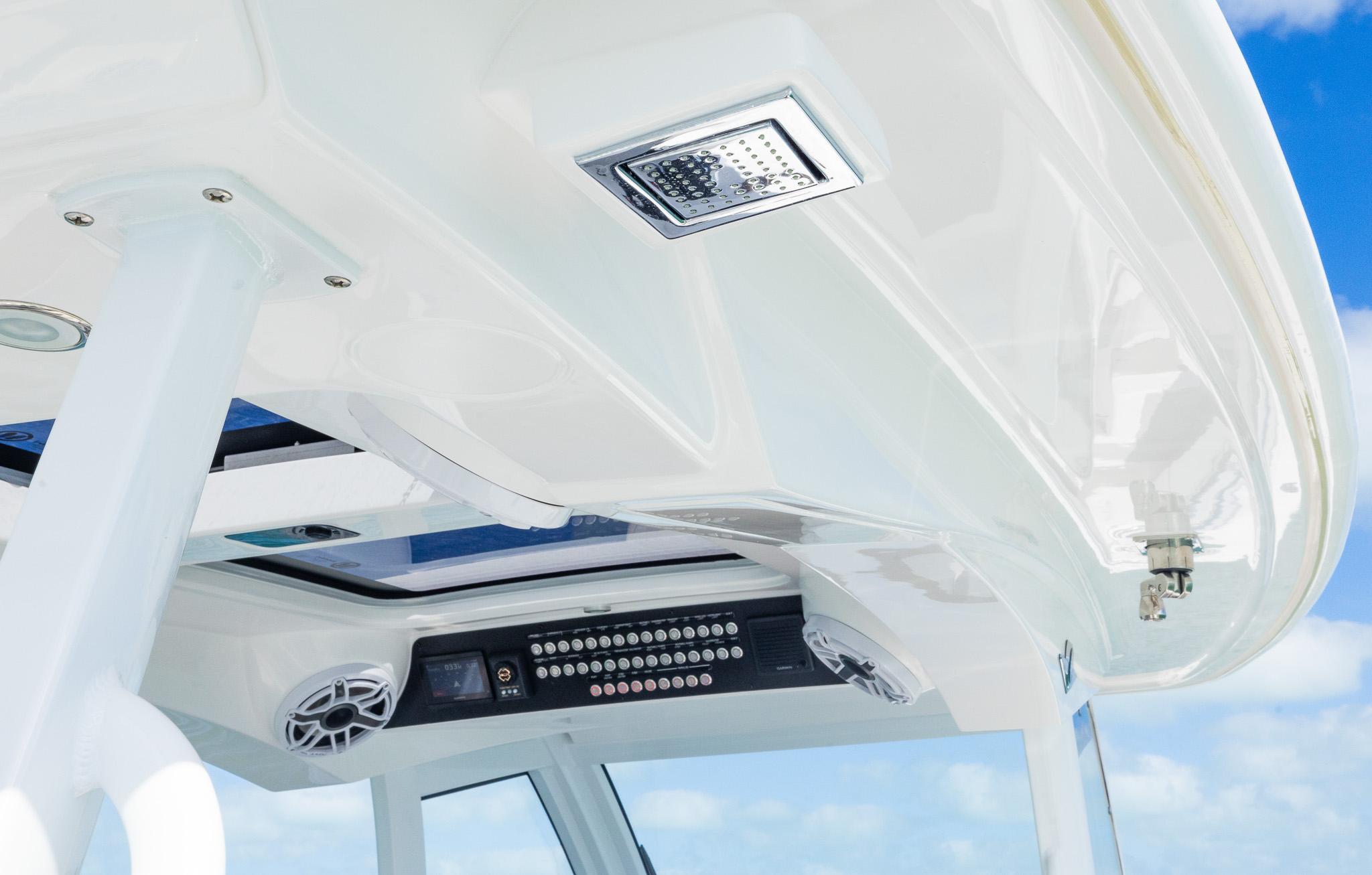 2025 Blackwater 43 Sportfish boat interior with modern controls and speakers.