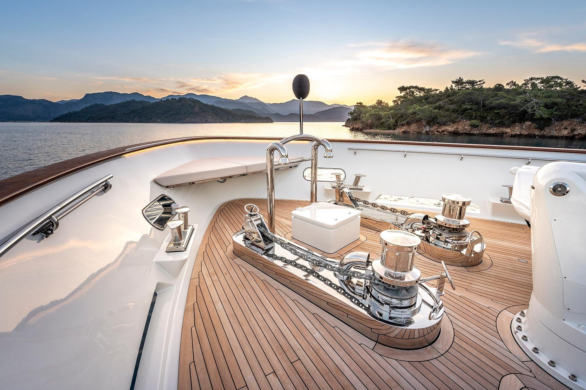 Luxurious 2019 Yildiz 141 yacht deck with scenic sunset view.