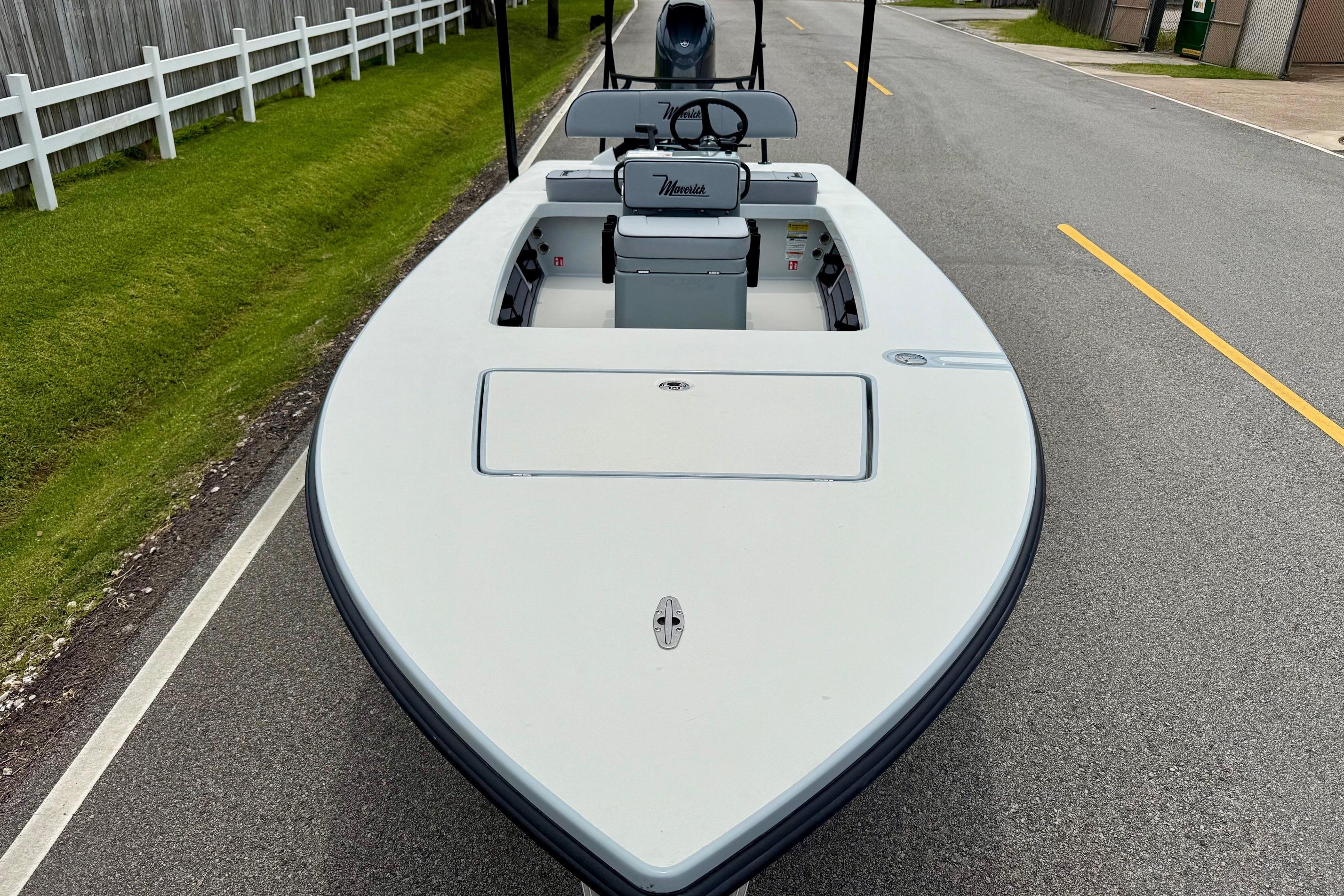 2026 Maverick 17 HPX-S boat on road, showcasing sleek design and modern features.