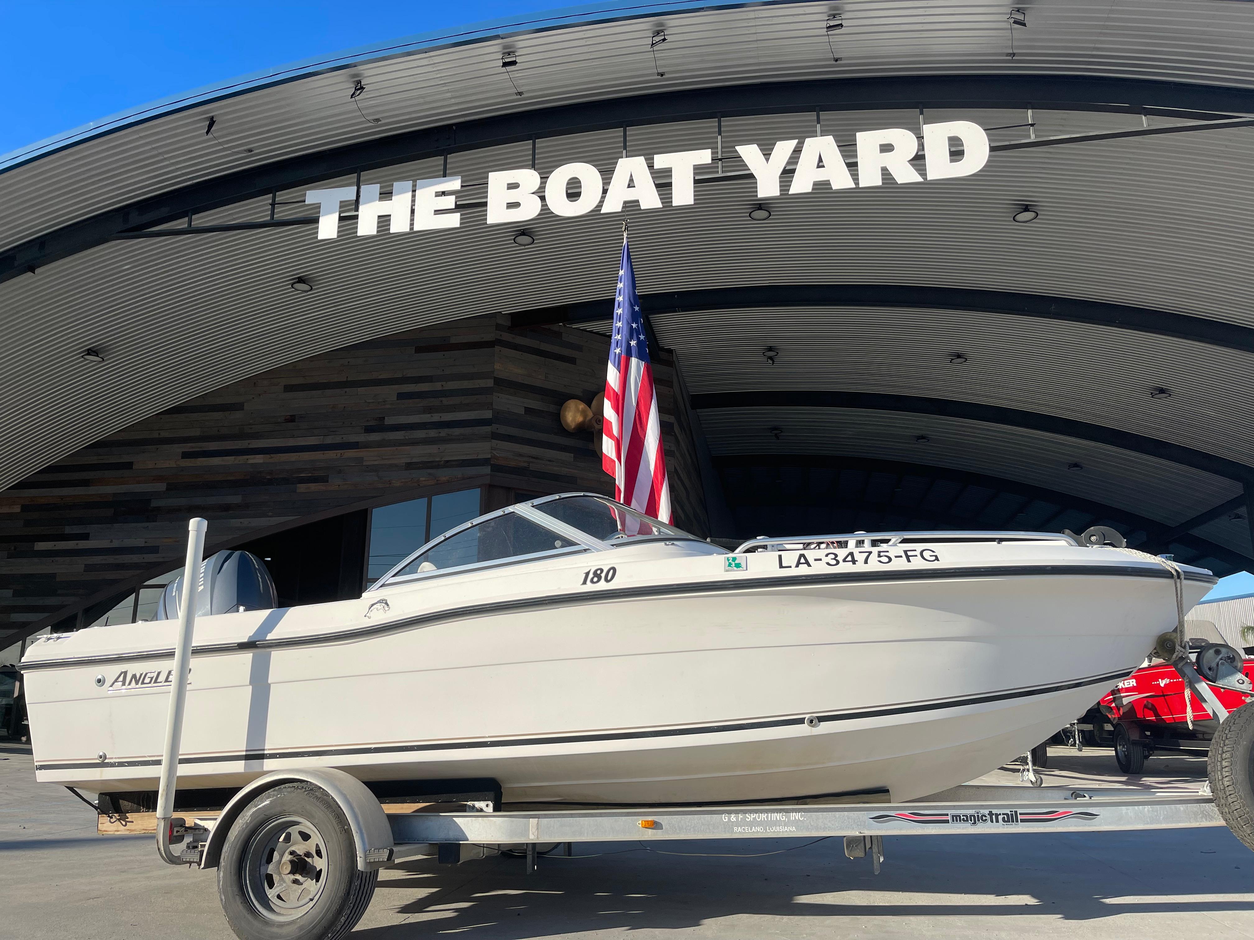 2002 Angler 18 DC boat on trailer at The Boat Yard.