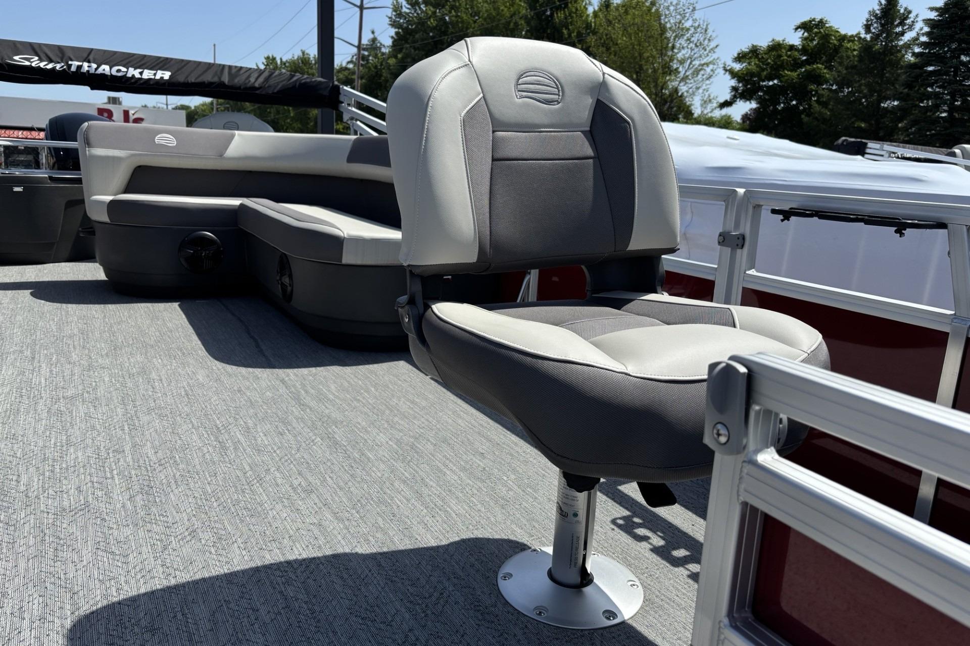2026 Sun Tracker Bass Buggy 18 DLX pontoon boat with comfortable seating and sleek design.