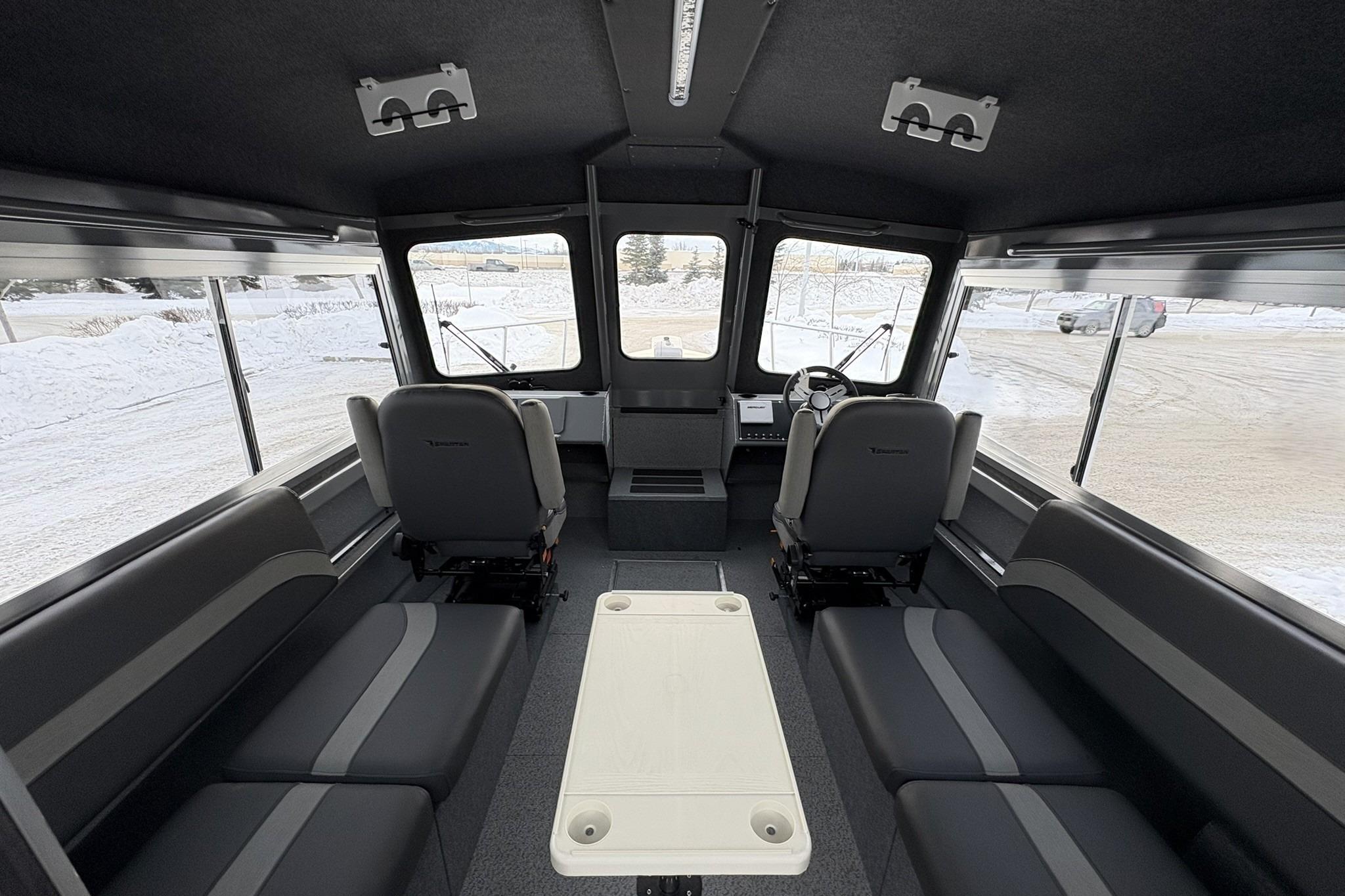 Interior of 2024 Spartan 26 Maximus Pro XL, featuring spacious seating and modern design.