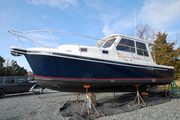A 2005 Fox Island Thirty Sedan Cruiser is on a dry dock.