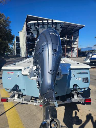 2026 Sea Hunt BX 22 BR boat with Yamaha 200 engine, parked outdoors.