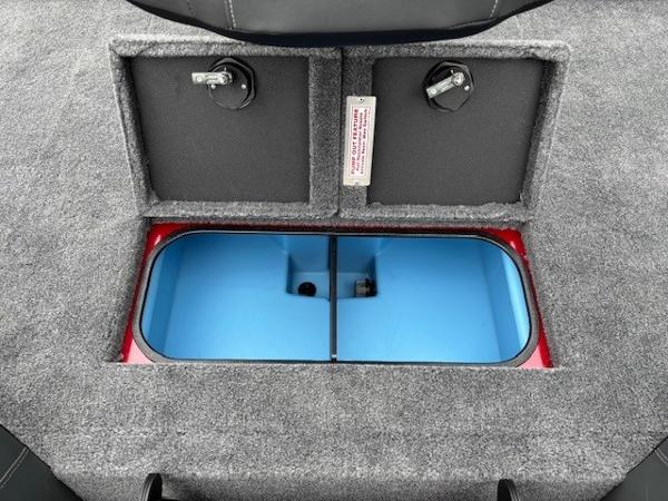 2025 Tracker Savage 215 boat storage compartment with dual lids and blue interior.