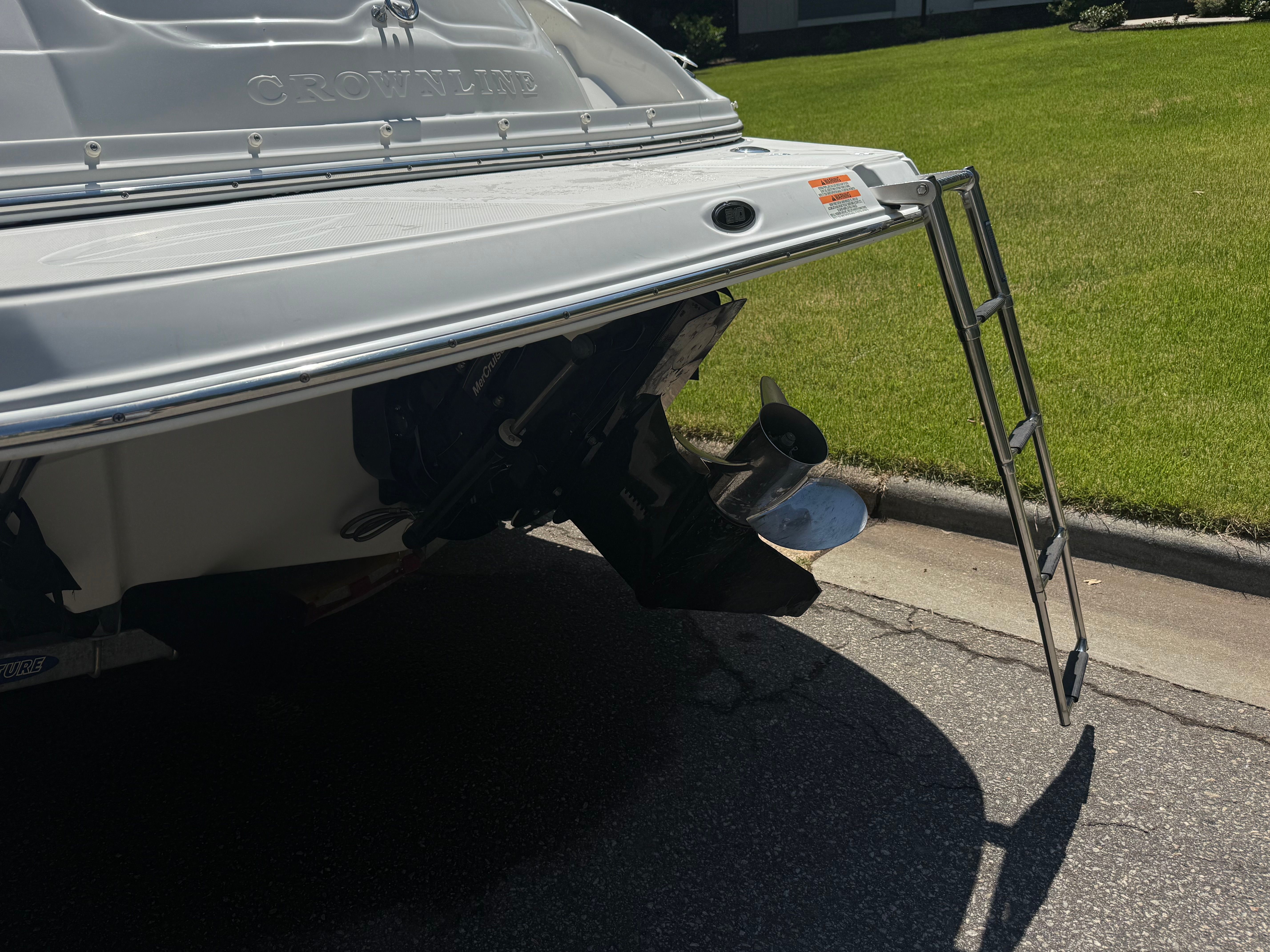 Rear view of a 2008 Crownline 210 LX boat with ladder.