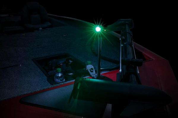 A Tracker Pro Team 175 TXW boat with a glowing green light on the deck.