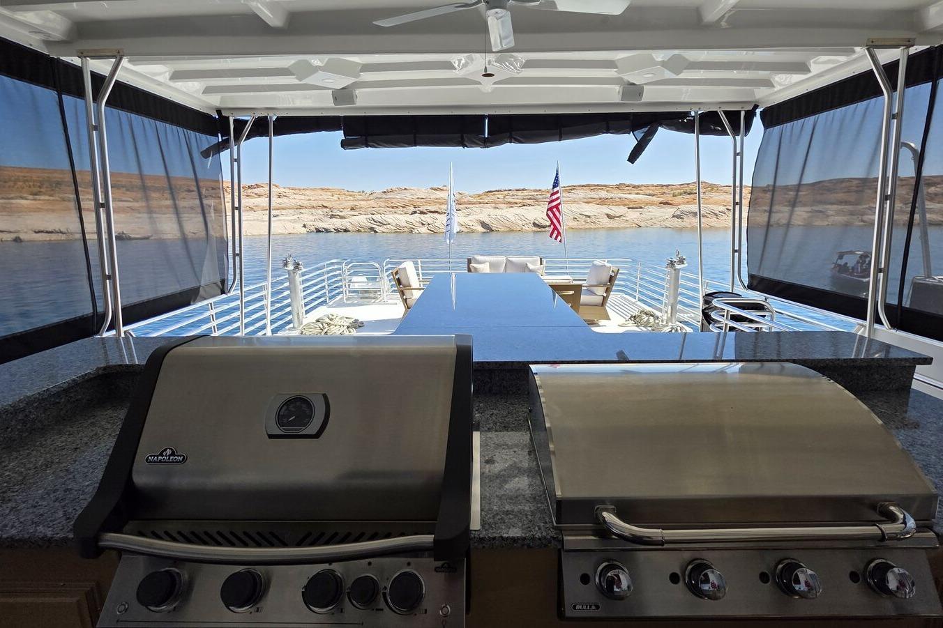Luxury Sumerset houseboat with grills, spacious deck, and scenic lake view, 2025 model.