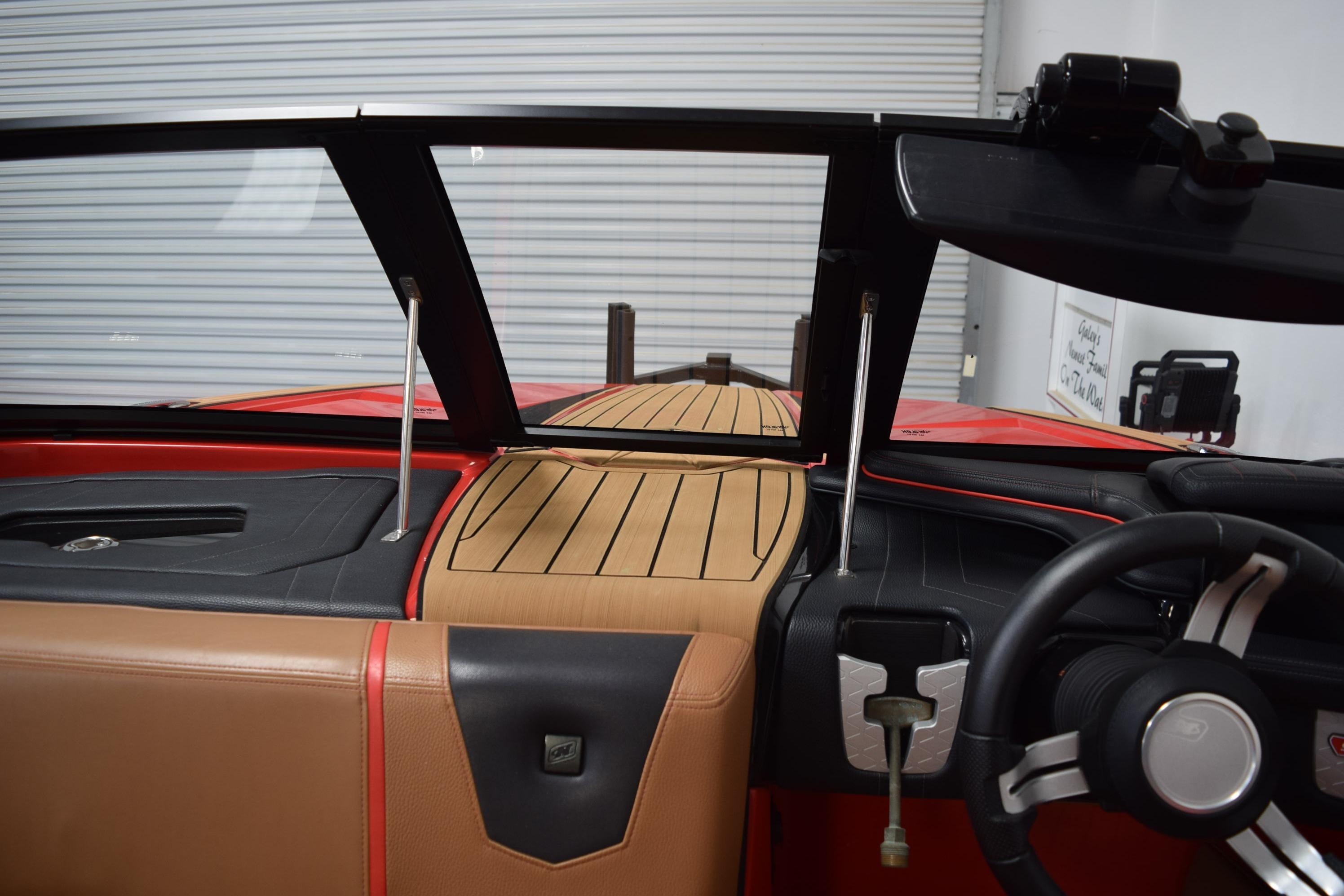 2024 Nautique Ski Nautique interior with sleek dashboard and modern steering wheel design.