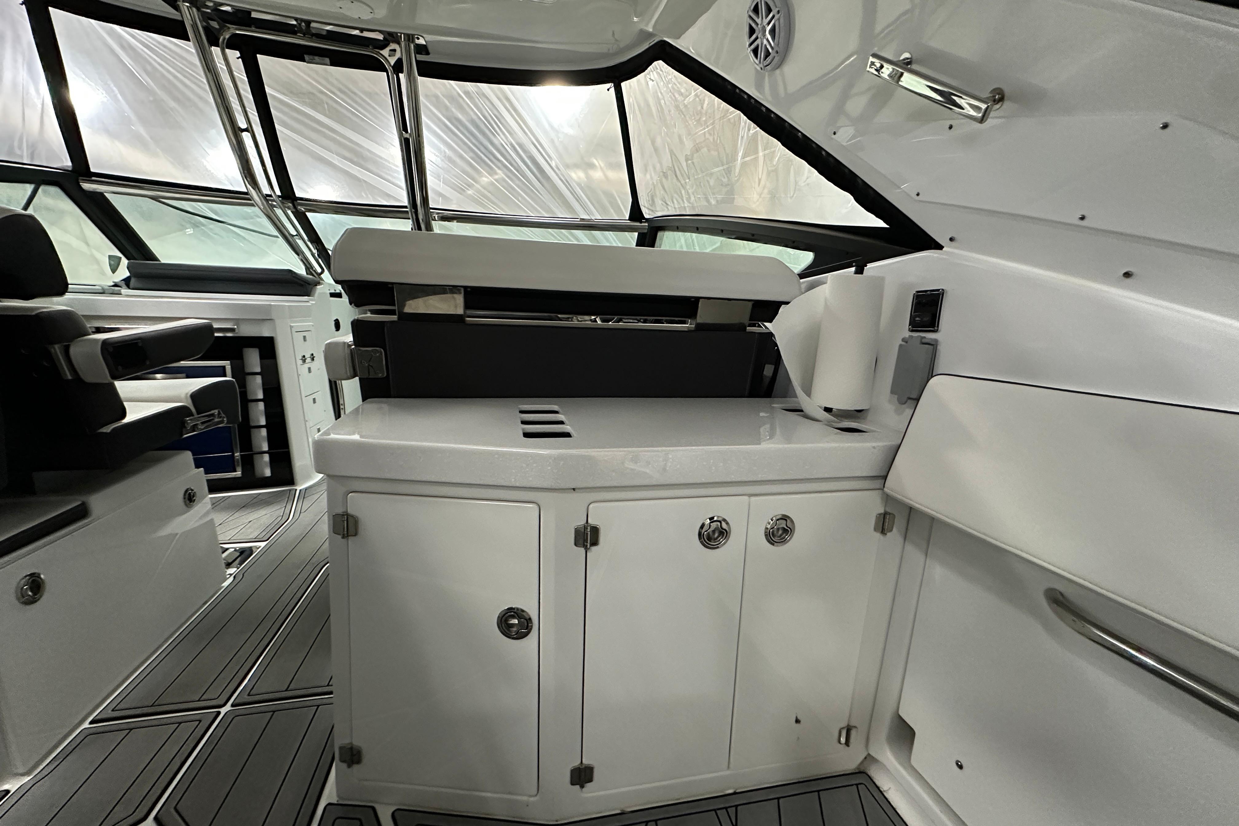 Interior of 2023 Monterey 378SS Super Sport boat, featuring sleek cabinetry and modern design.
