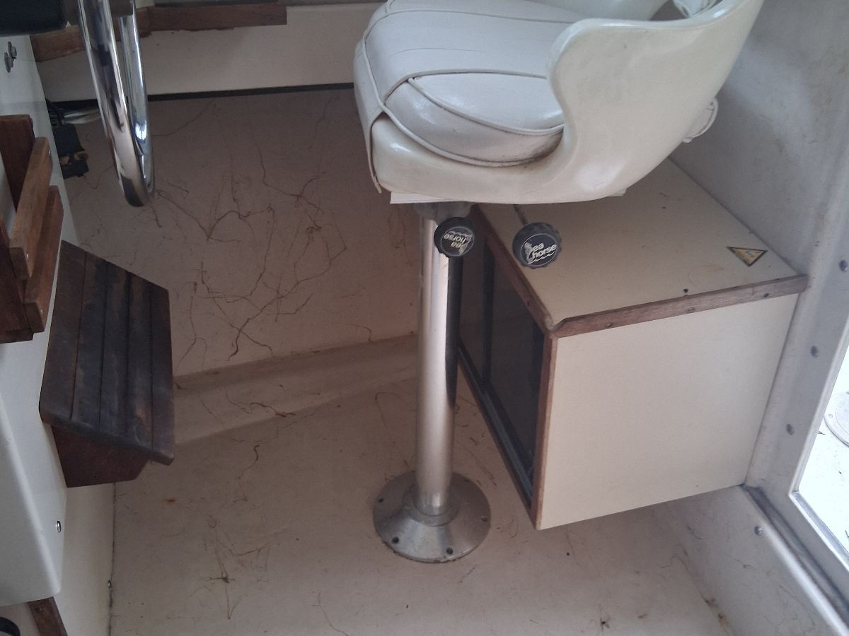 Interior of a 1987 Parker Sou'wester boat with steering seat.