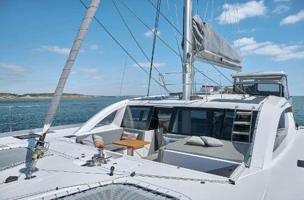 Luxury Privilege Signature 580 yacht, 2025 model, sailing on a sunny day.