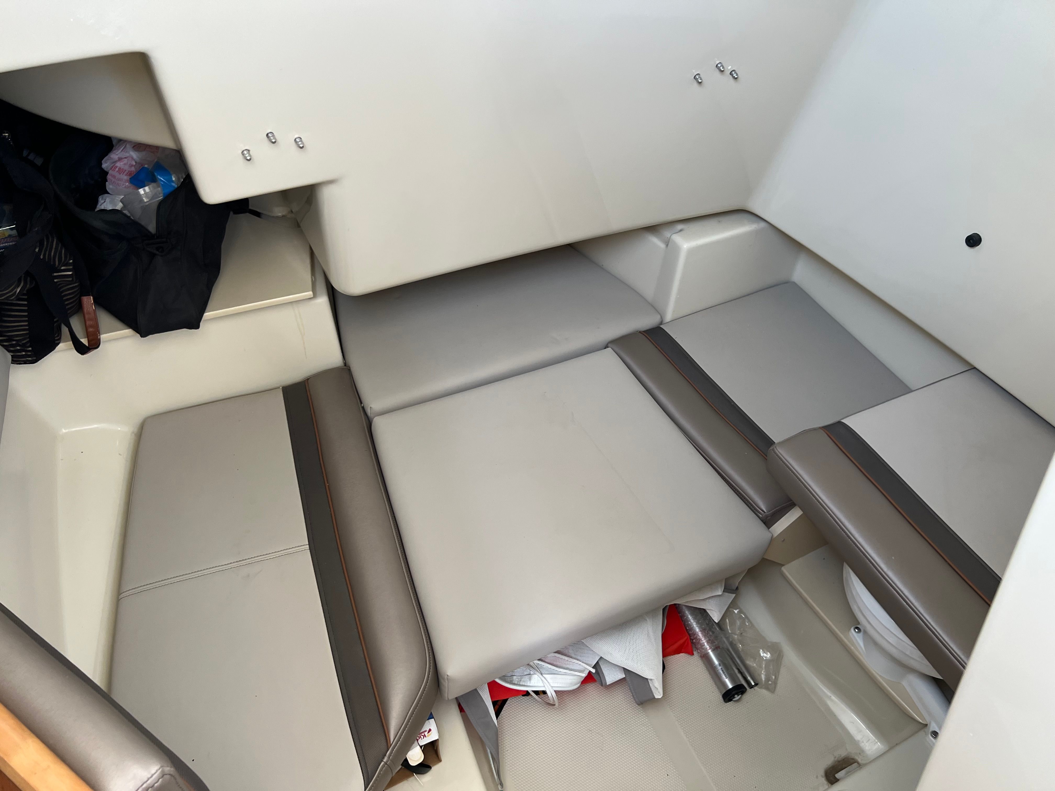 Interior of a 2022 Cutwater C-24 CW boat with cushioned seating areas.