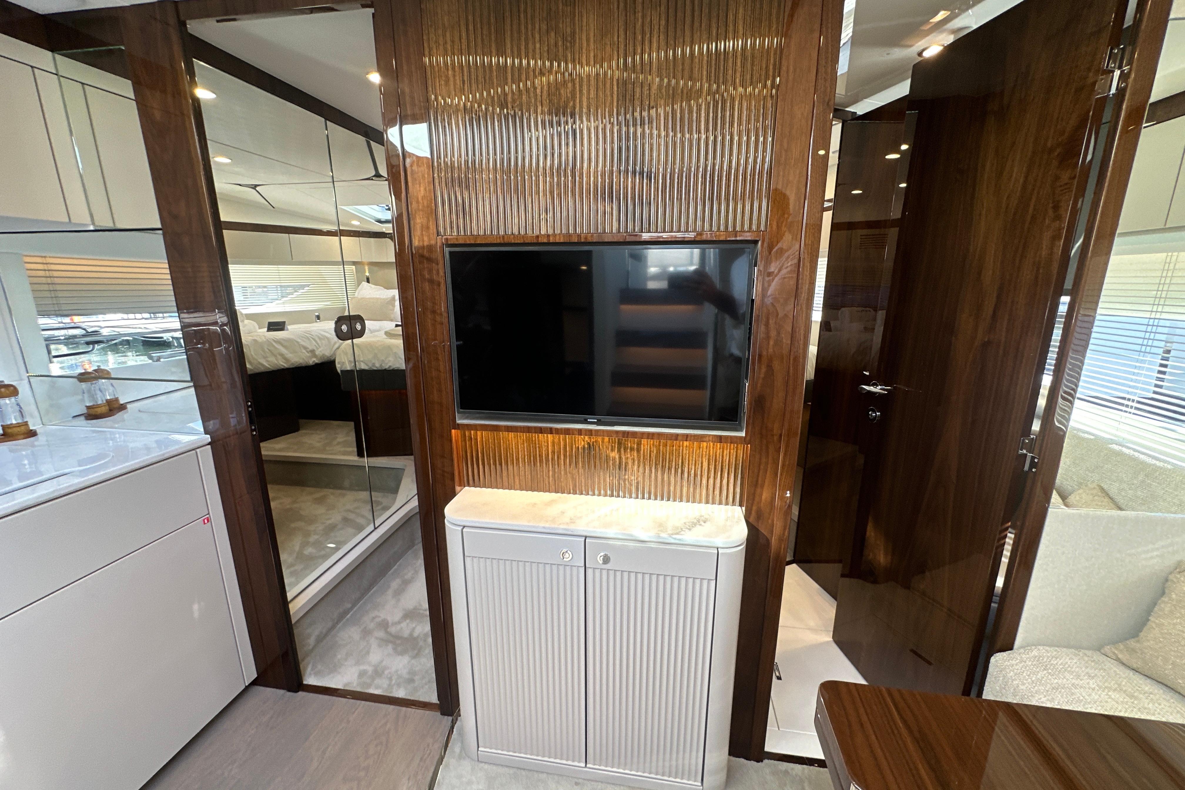 Luxurious interior of 2026 Fairline Targa 47 GT yacht with modern wood finishes.