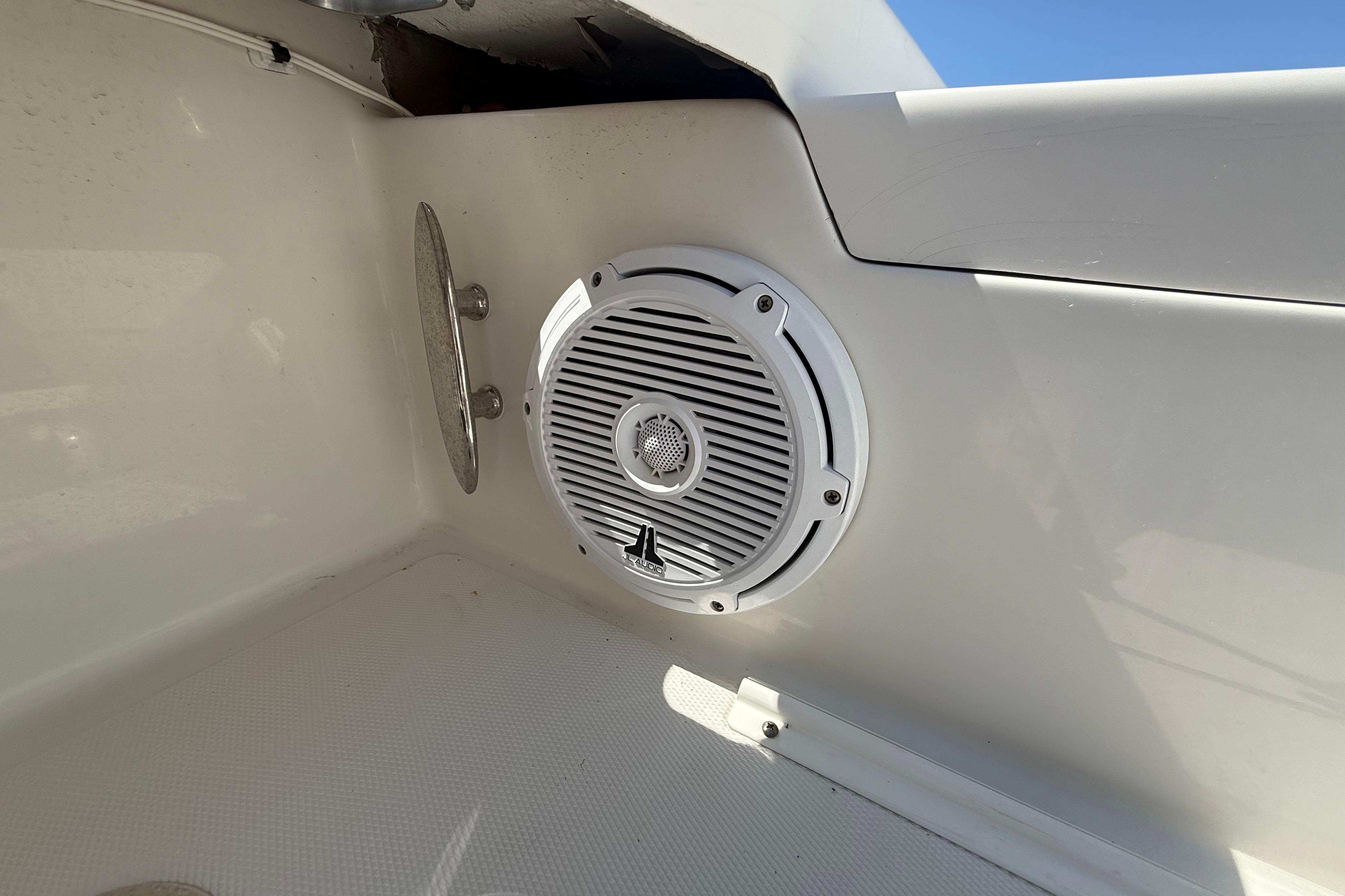 Boat speaker and vent on 2019 Calcutta 263 model, white interior.