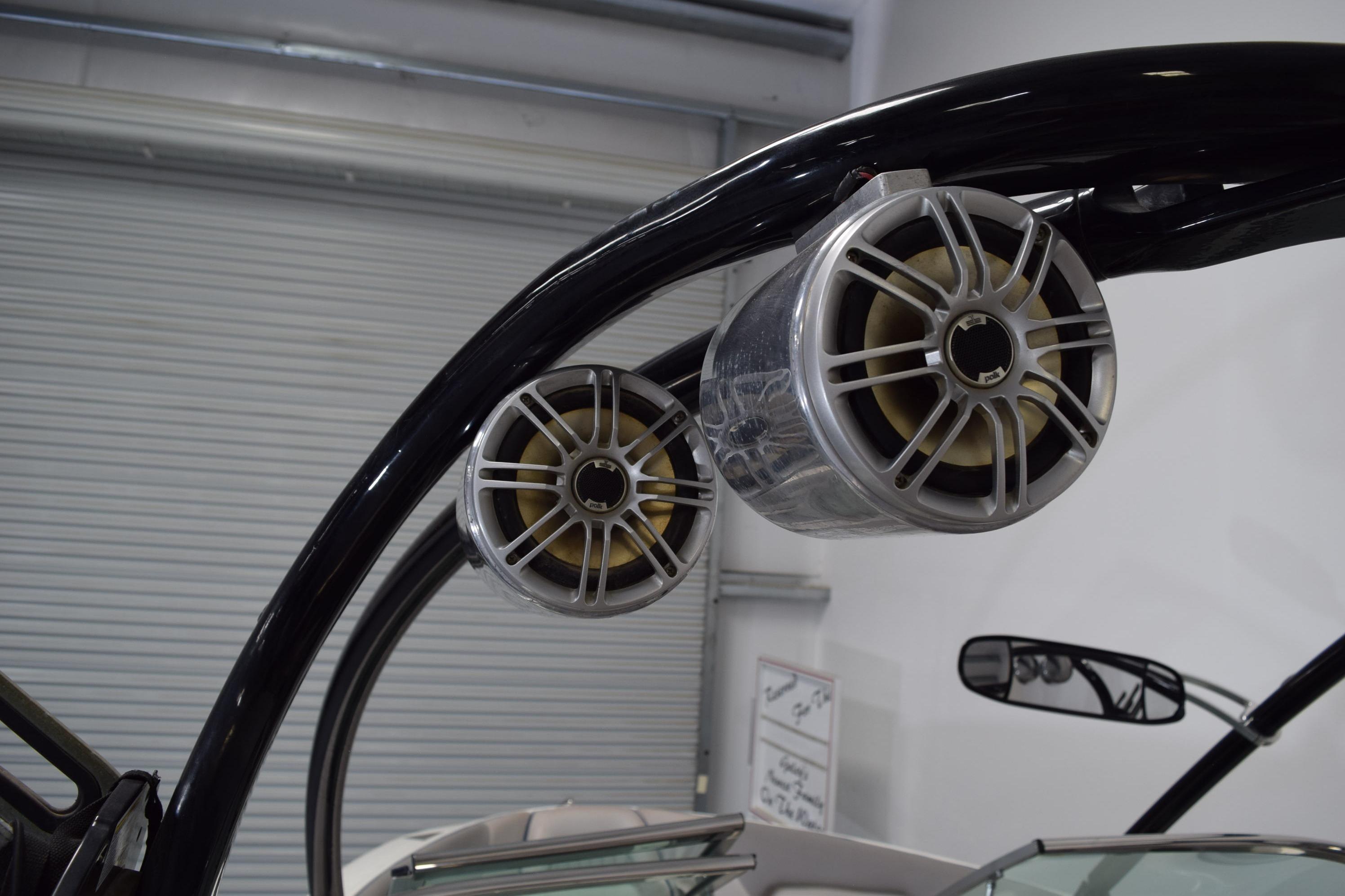 Speakers mounted on a 2007 Centurion SV 240 boat's wakeboard tower.