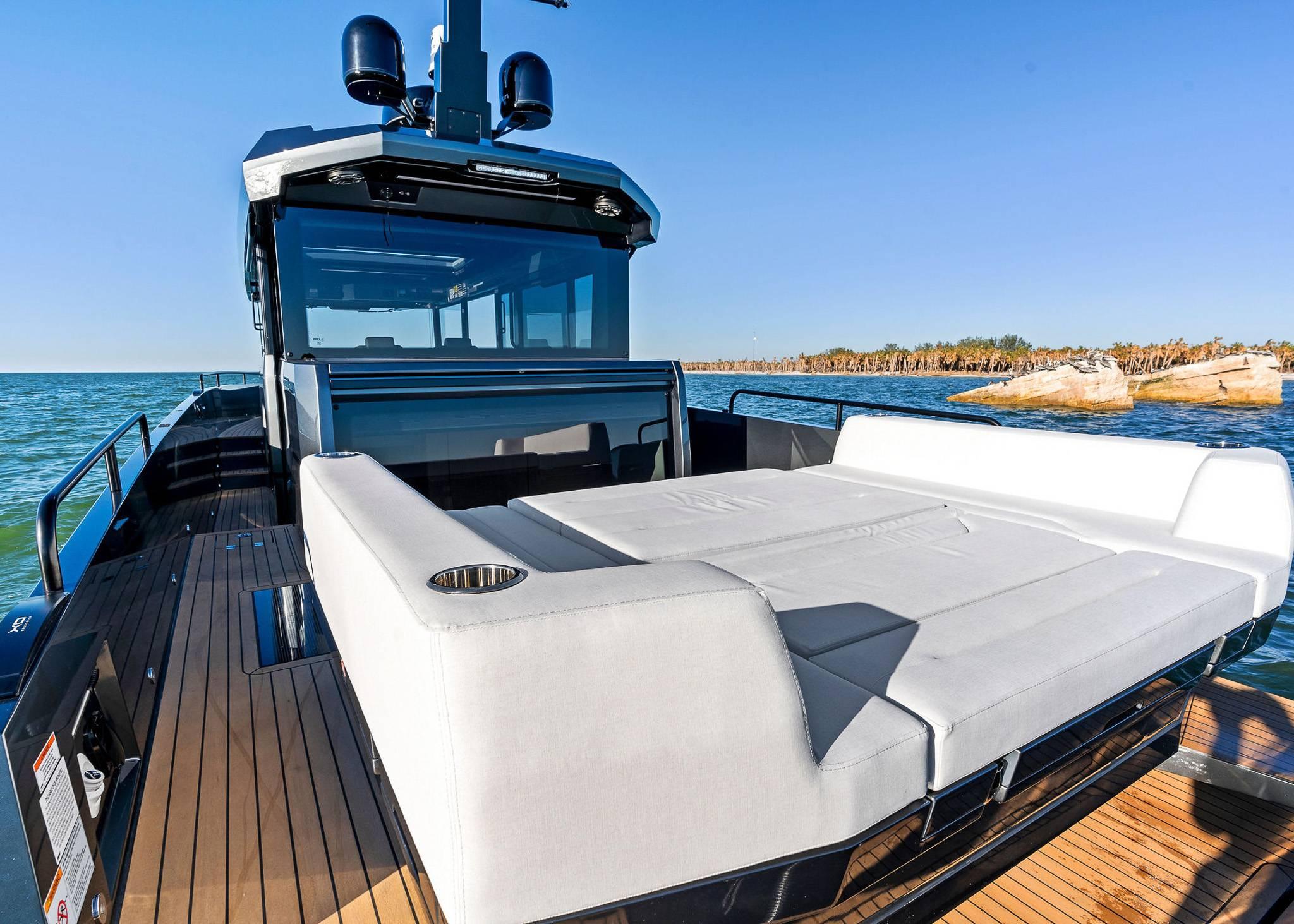 2025 XO Boats EXPLR 44 yacht with spacious deck and luxurious seating on open water.