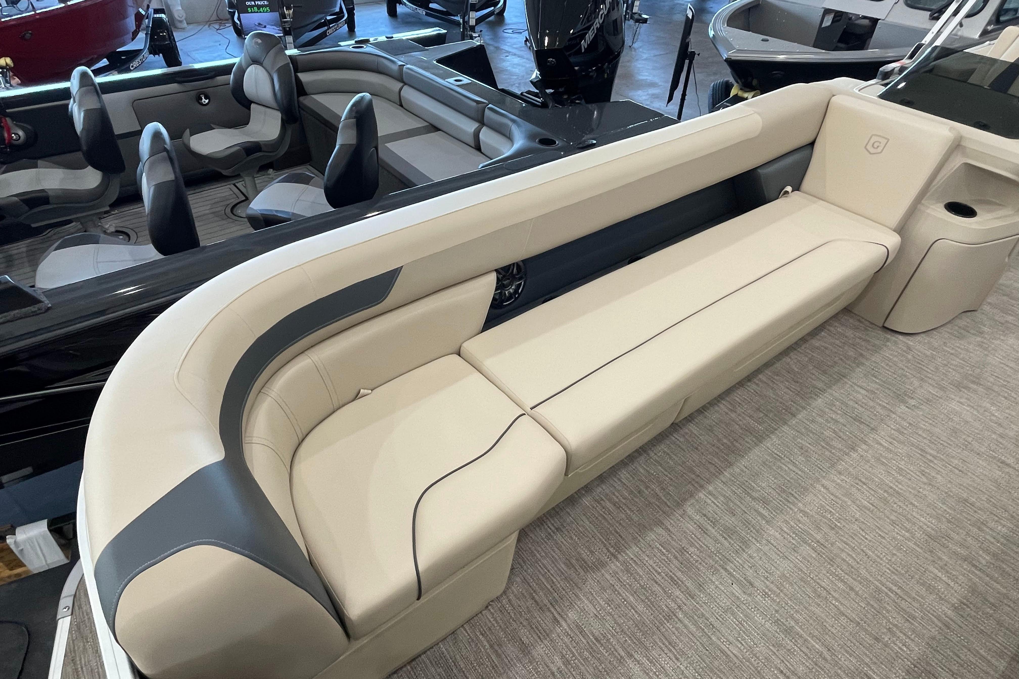 Luxurious seating on 2026 Godfrey Sweetwater 2286 C pontoon boat, featuring elegant design.