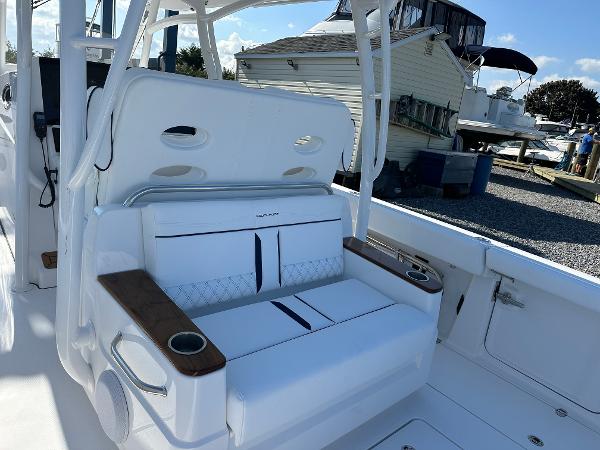2025 Southport 33 FE boat interior with white seating and cup holders.