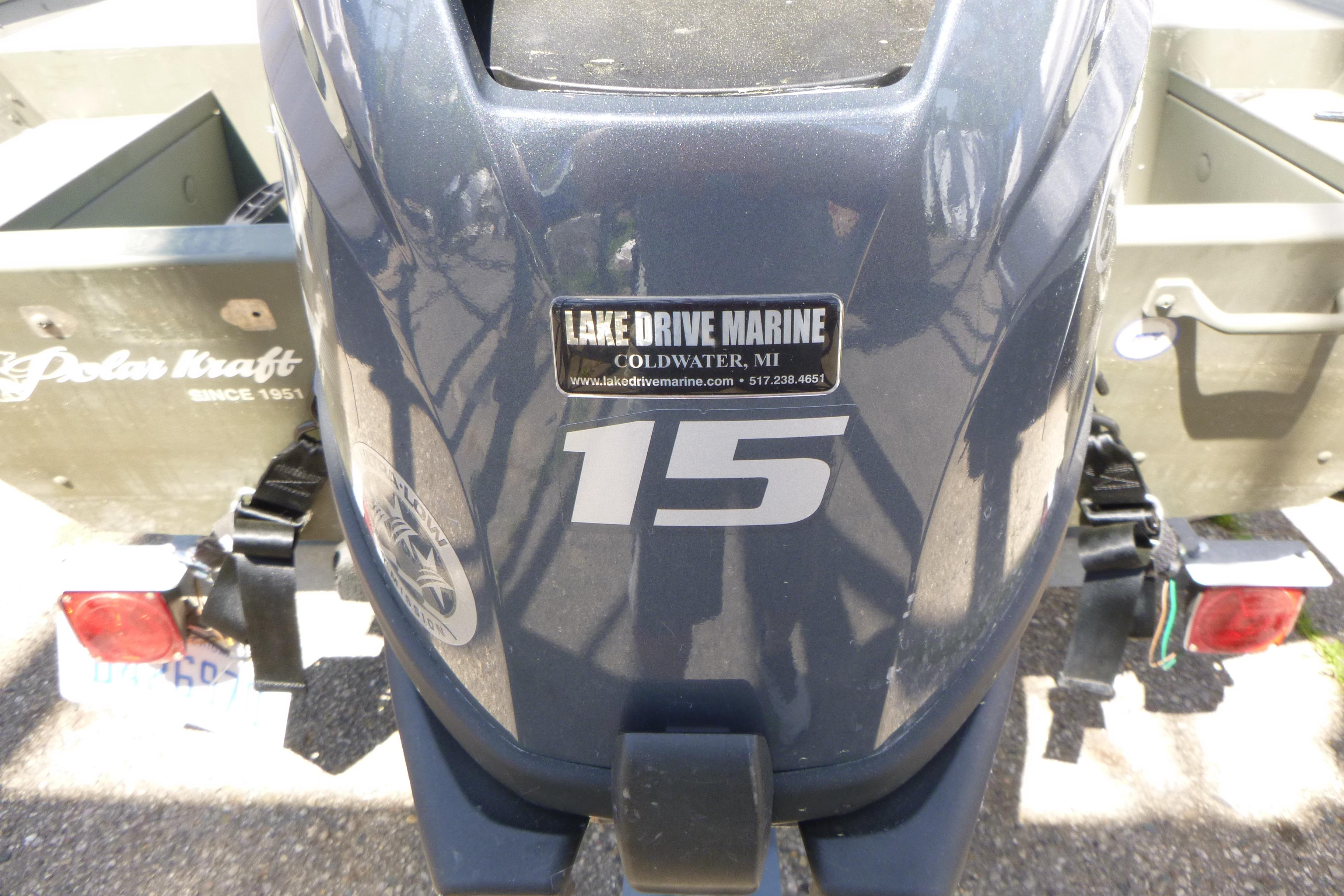 2014 Polar Kraft Jon MV 1448 LW boat with Lake Drive Marine sticker and 15 horsepower engine.