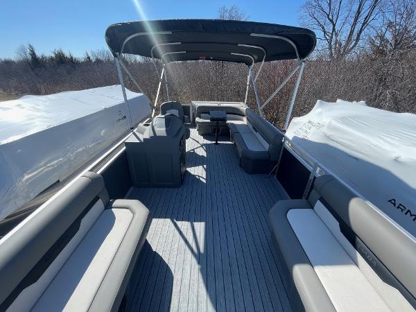 2025 Armada Saphir 23CR pontoon boat with spacious seating and canopy, outdoors.