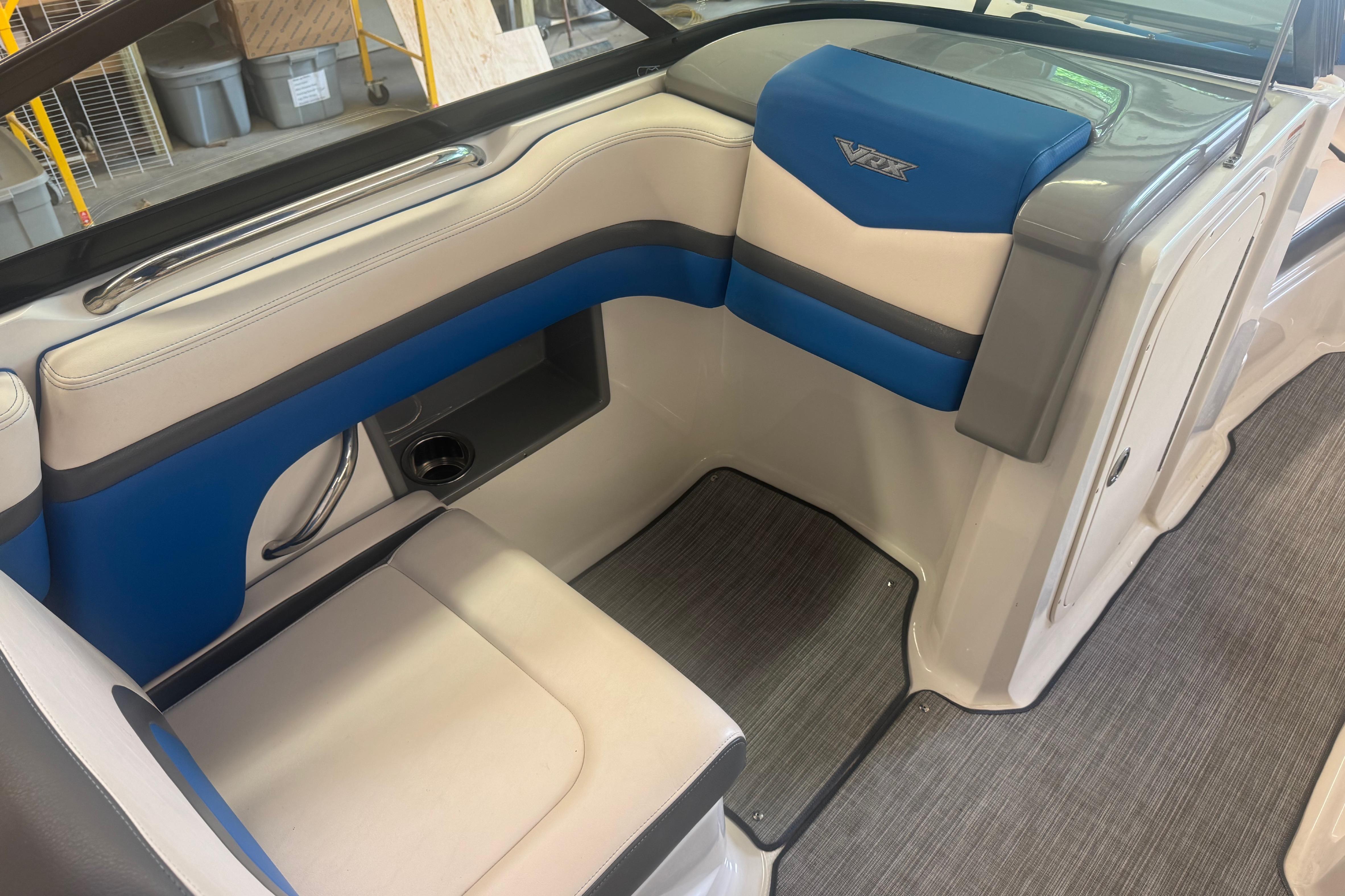 2017 Chaparral Vortex 203 VRX boat interior with blue and gray seating.