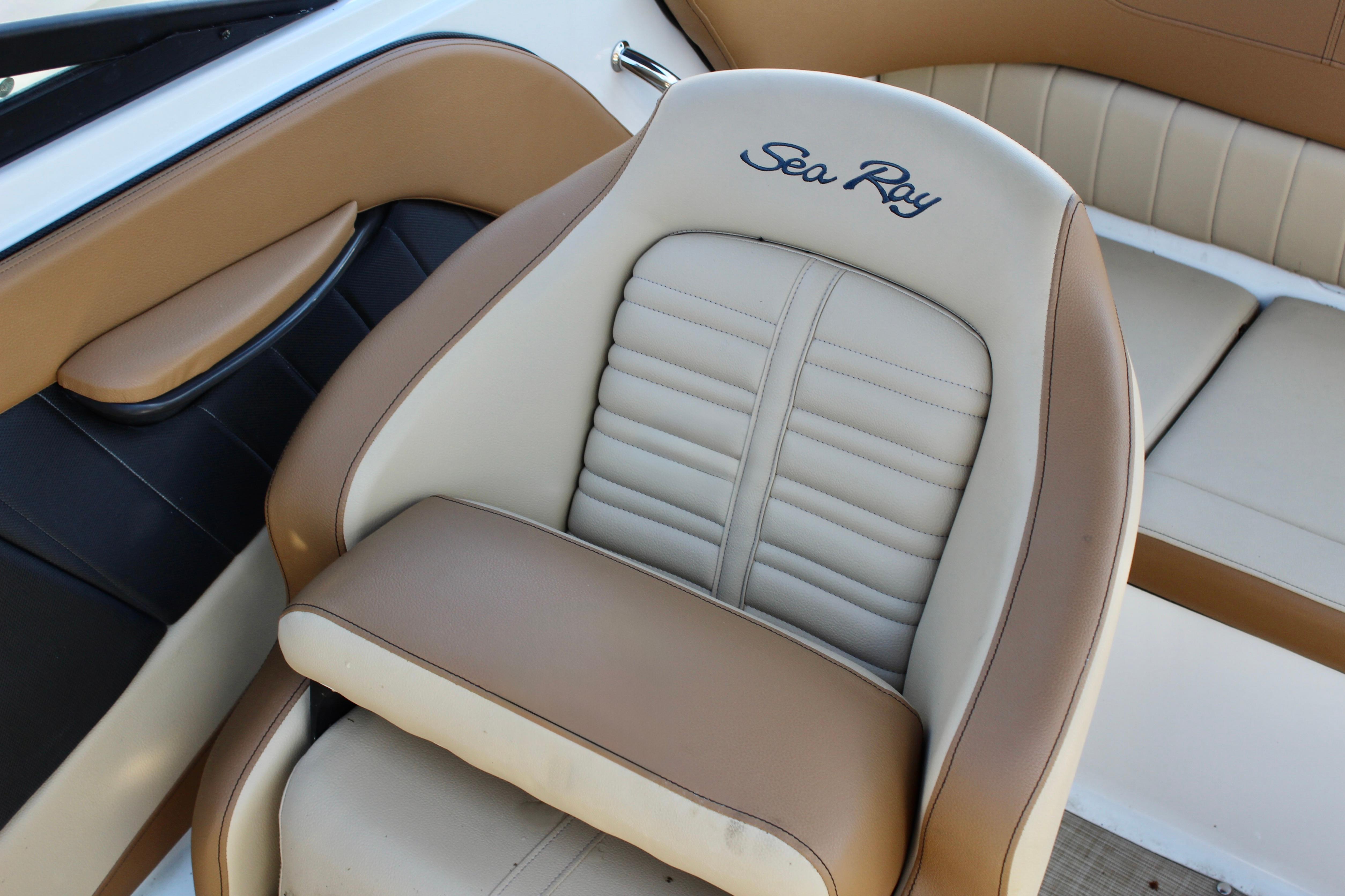 2018 Sea Ray SPX 190 Outboard boat seat with tan and cream upholstery.