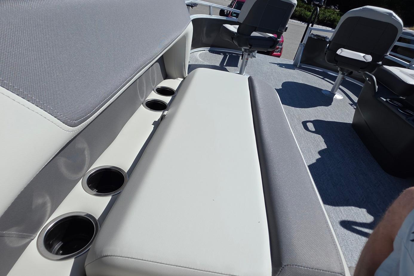 Interior of 2026 Sun Tracker BB 16 XLS boat with seating and cup holders.