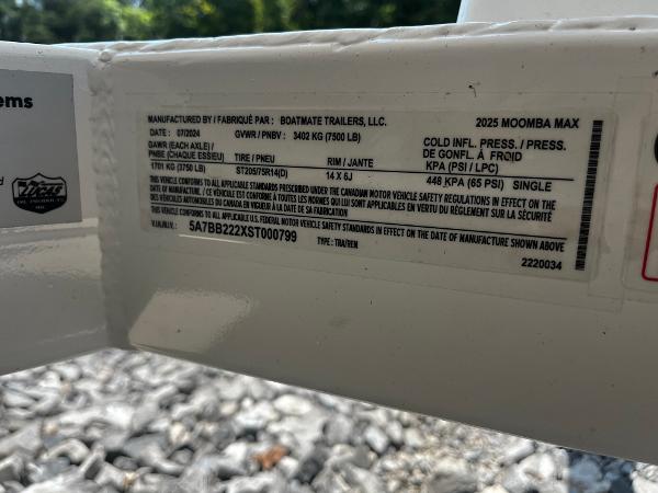 Label on 2025 Moomba Max trailer by Boatmate Trailers, LLC, showing specifications and tire pressure.
