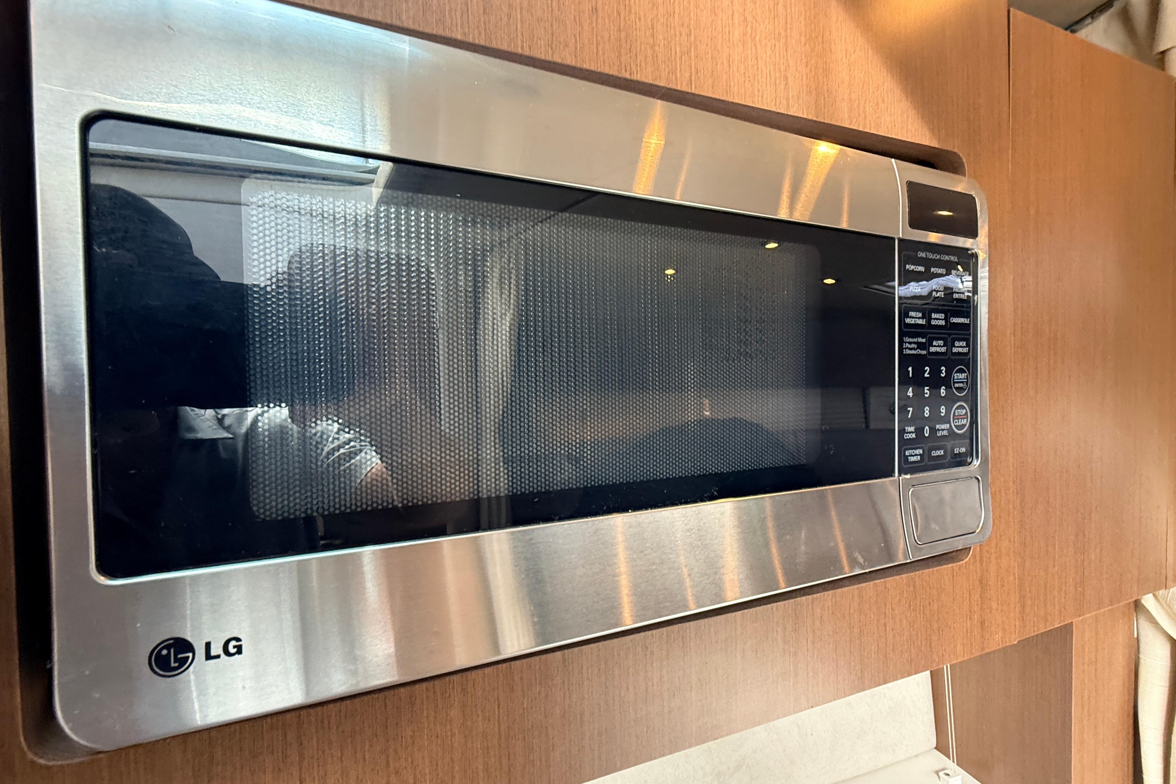 LG microwave installed in a 2013 Sea Ray 370 Venture yacht kitchen.