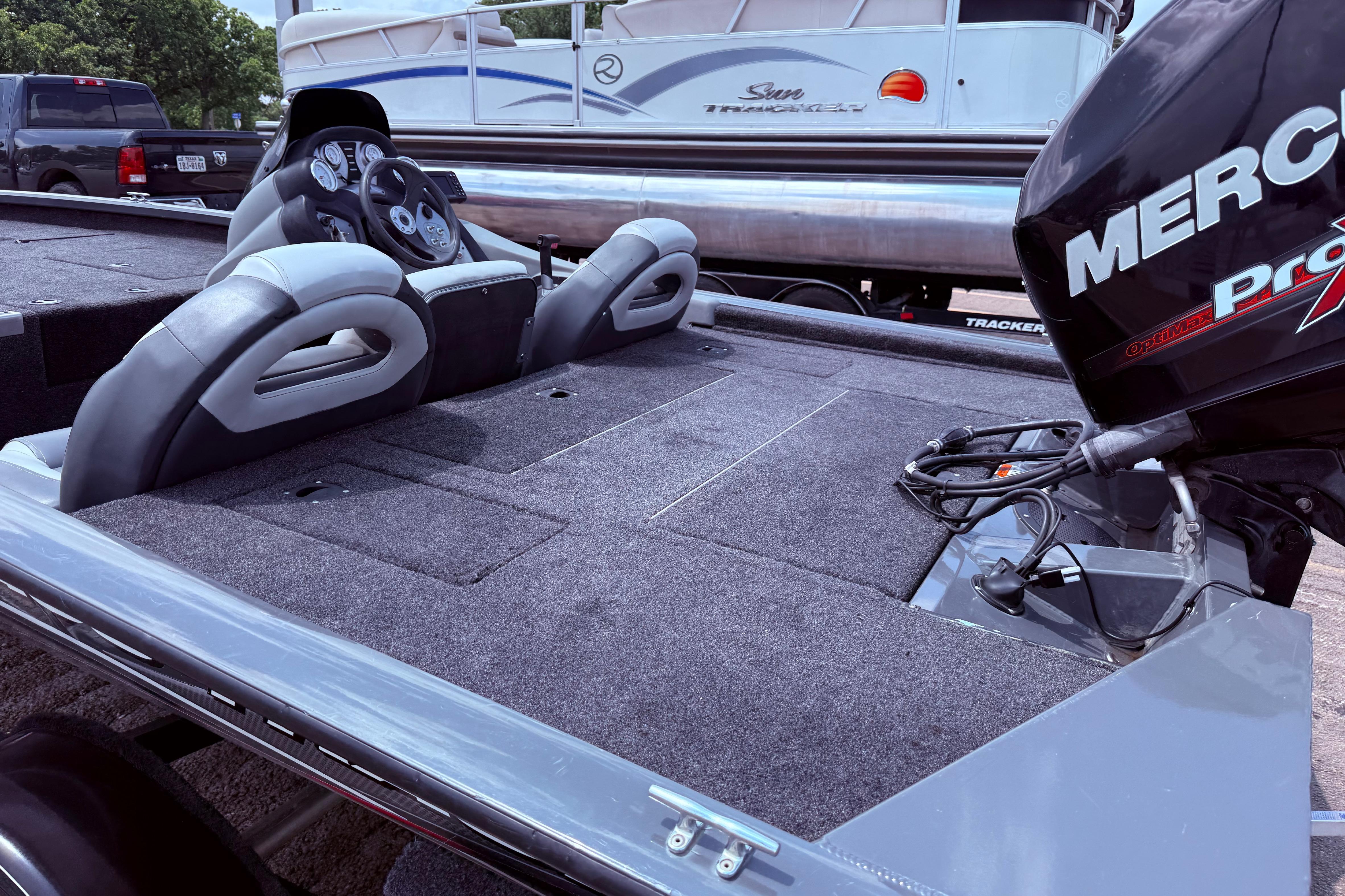2015 Tracker Pro Team 190 TX boat interior with Mercury engine, featuring dual seats and steering console.