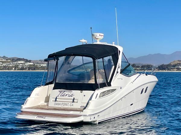 2014 Sea Ray 330 Sundancer yacht on calm water near Dana Point, CA.