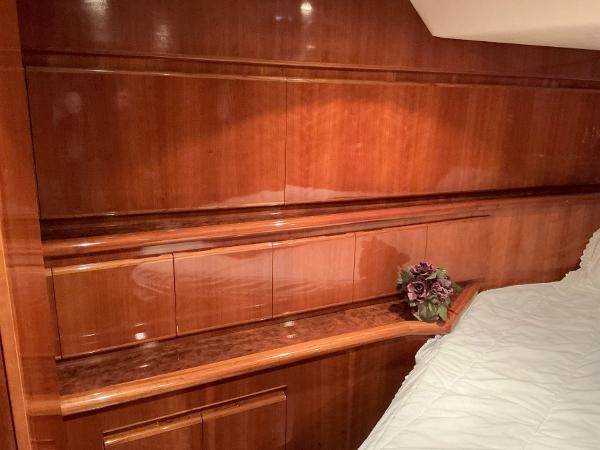 Luxurious wood interior of 2000 Novatec Islander 55 yacht cabin.