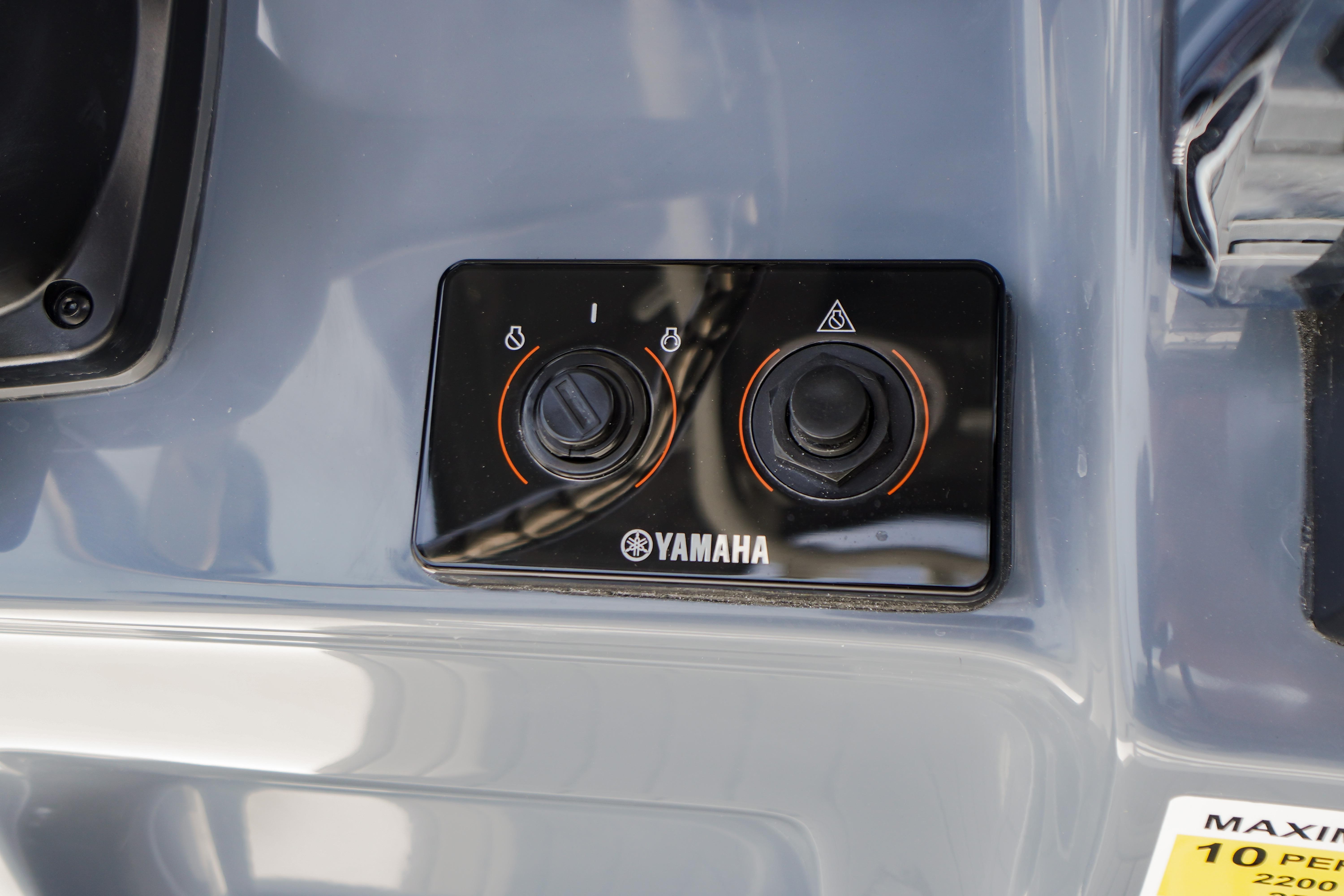 Control panel of a 2027 Tidewater 220 CC Adventure boat featuring Yamaha controls.