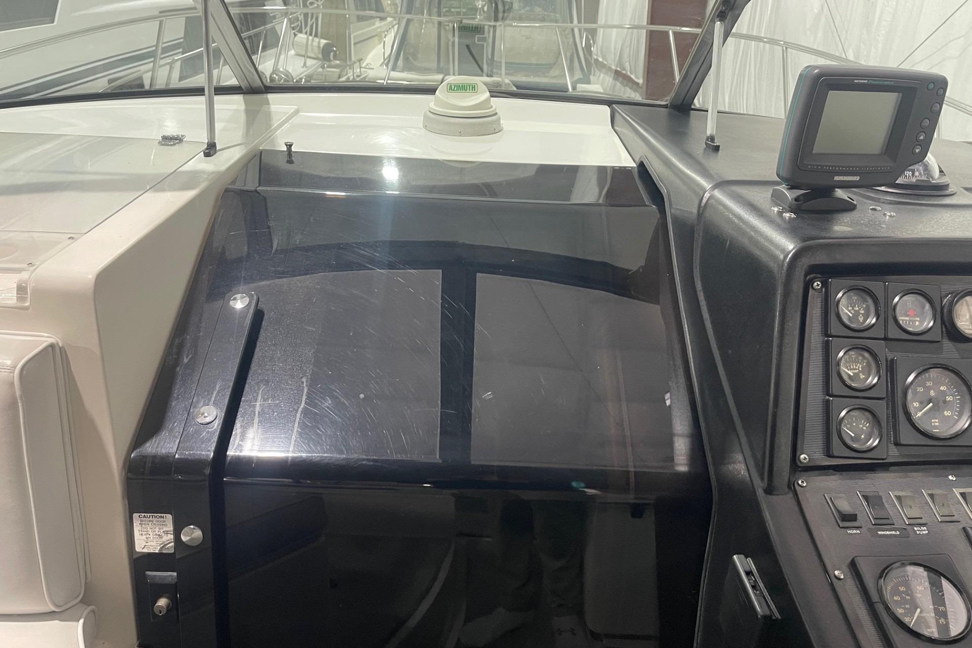 1992 Chaparral Signature 30 boat dashboard with gauges and navigation equipment.